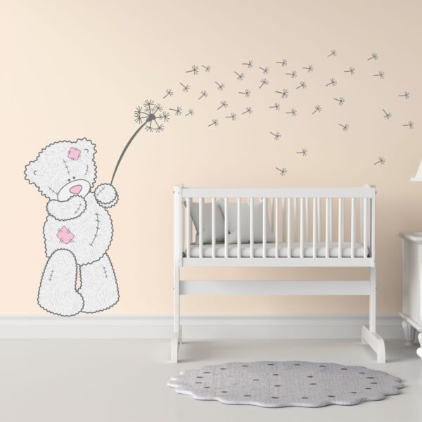 Teddy with a dandelion